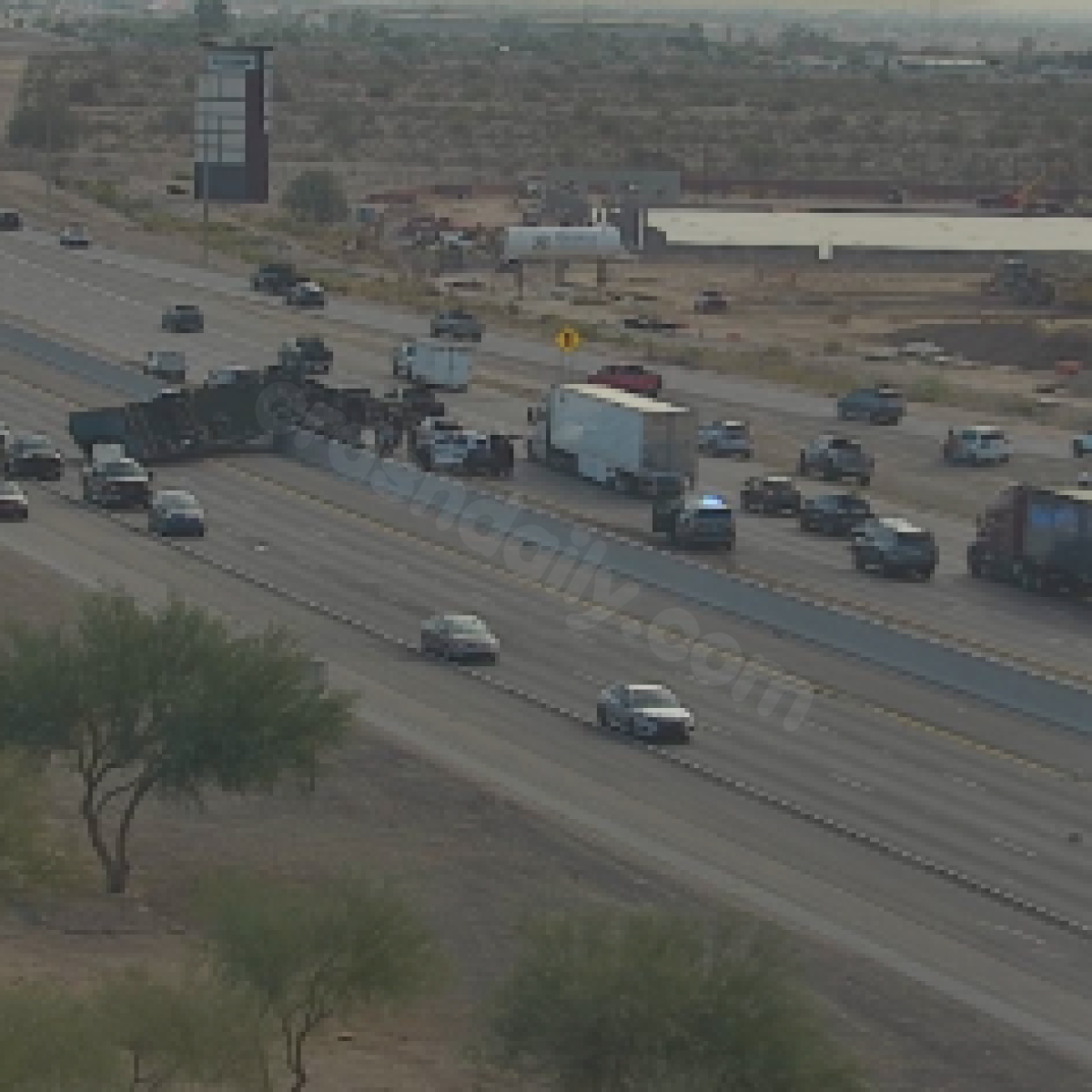 Semi-truck rollover accident on I-10 near Verrado Way