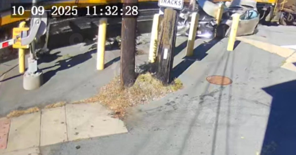 Video captures freight train colliding with car containing 84-year-old on Massachusetts tracks