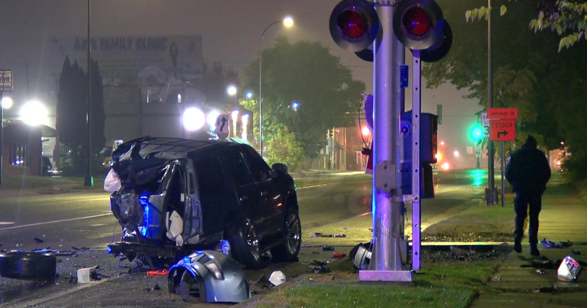 Car rear-ends train near Minneapolis' Columbia Park injures two.