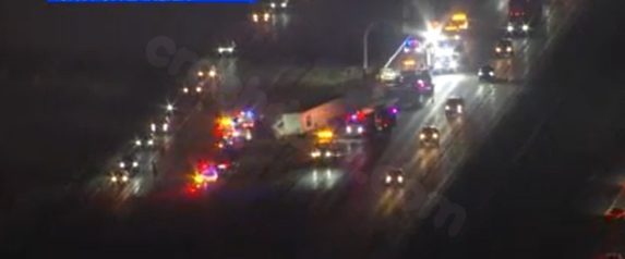 Deputy injured in semi collision with parked patrol car on I-25.