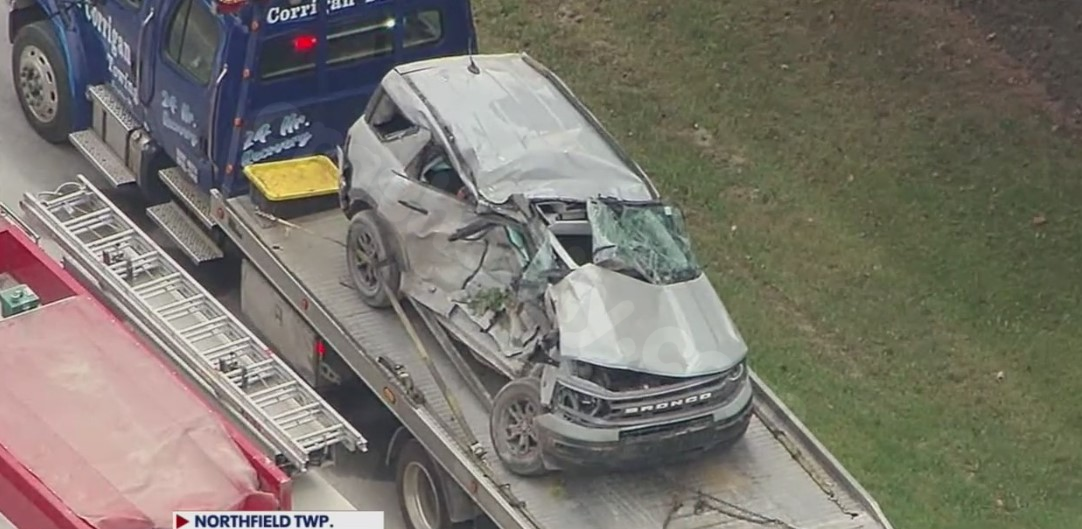 Woman, young child, and infant hurt in distracted driving collision with truck on 7 Mile