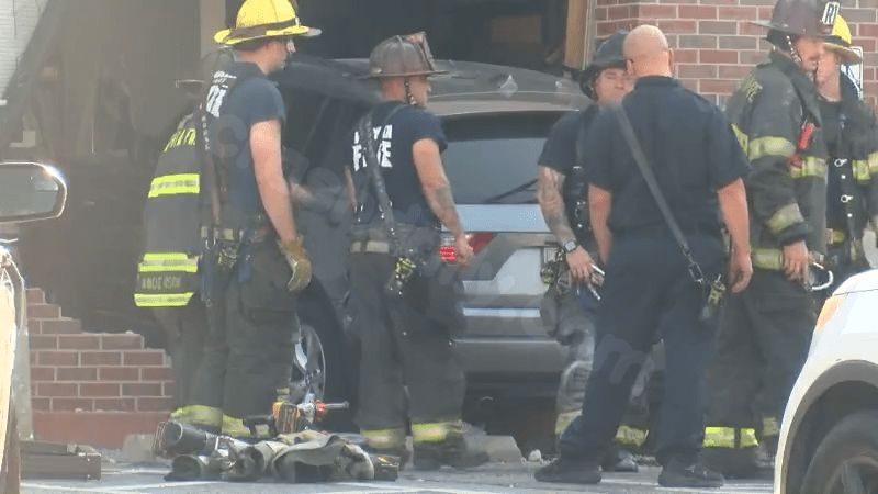 Vehicle collides with Wichita clinic, injuring two
