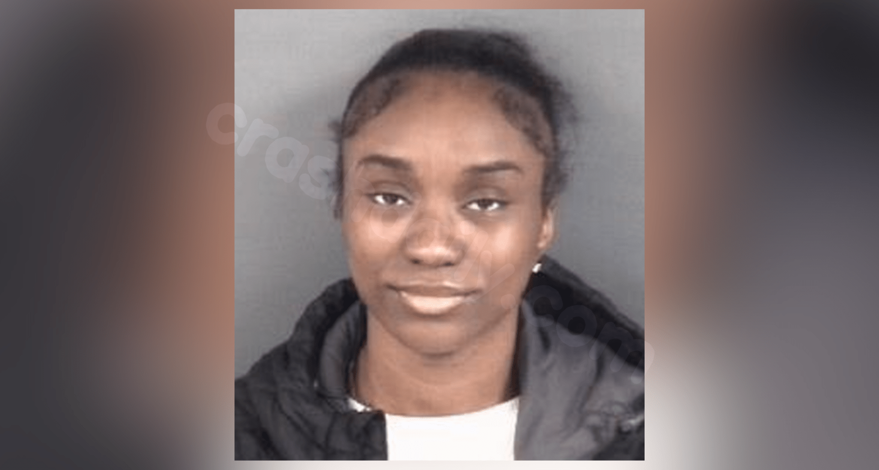 Fayetteville woman surrenders to police after being charged in crash that claimed lives of 3 high school students.