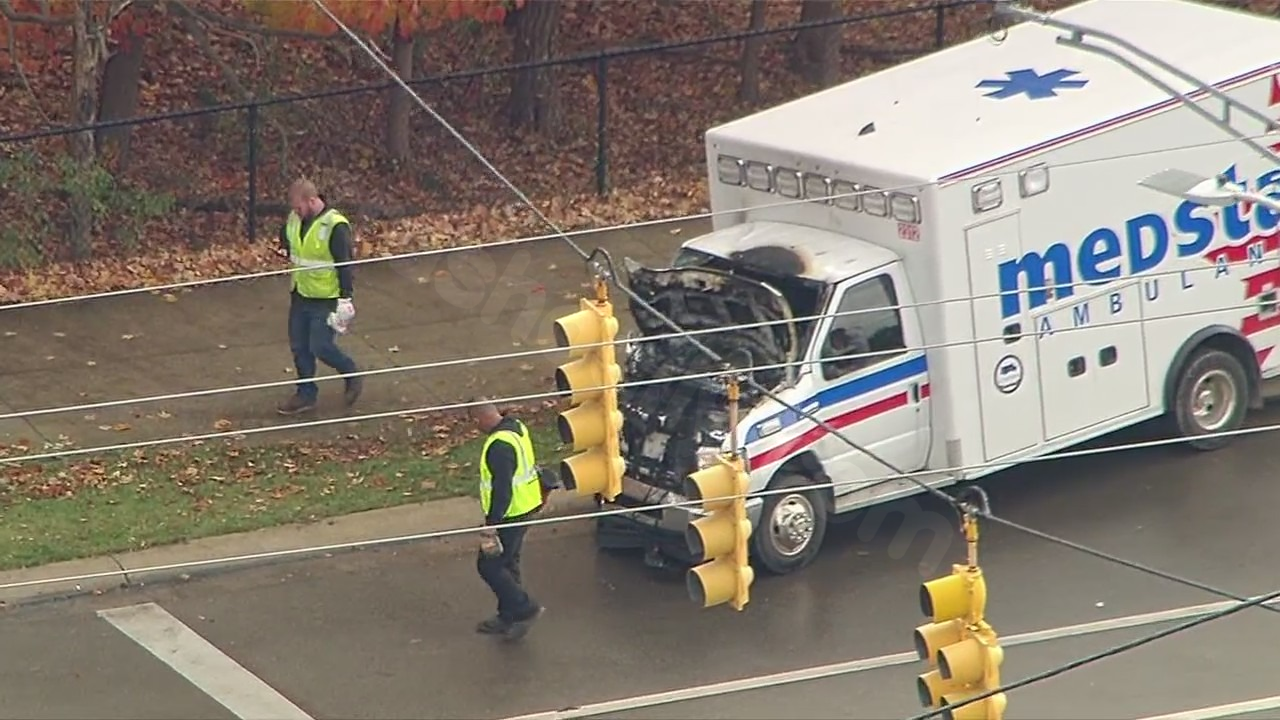 Ambulance with patient and paramedic crashes in Northville Township