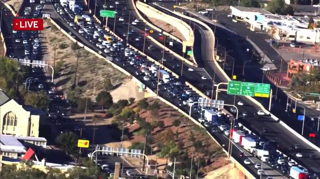 Closure of lanes on Interstate 25 due to rollover accident