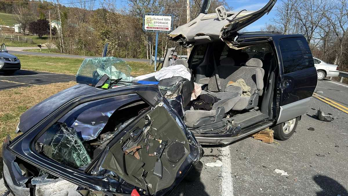Two people injured in multi-car crash with cars destroyed and driver stuck