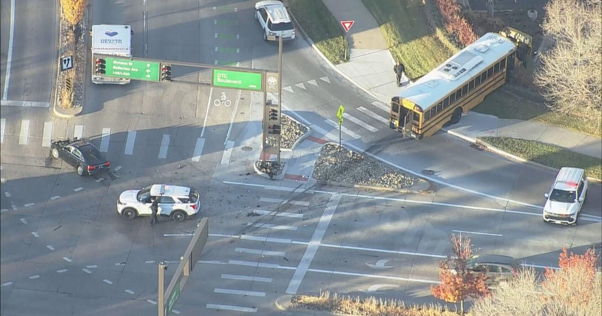Denver police investigate Friday morning crash involving school bus