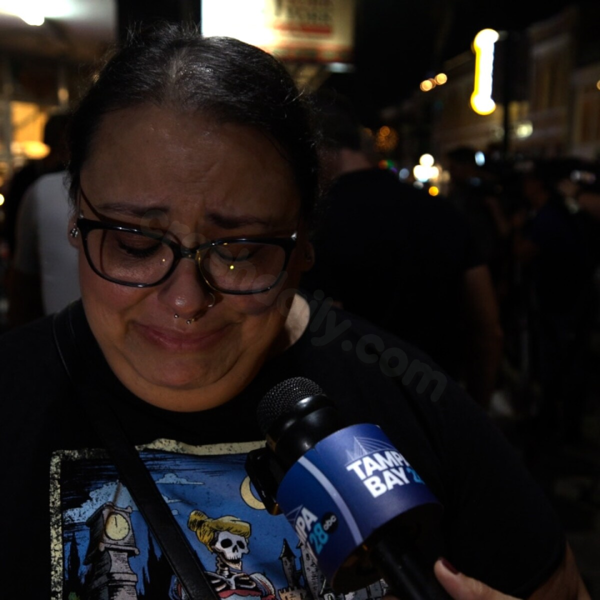 Tampa residents gather to honor victims of Ybor City car accident.