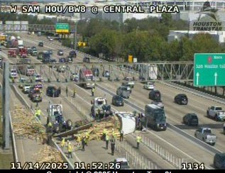 Crash with semi-truck blocks lanes on Sam Houston Tollway by Central Plaza