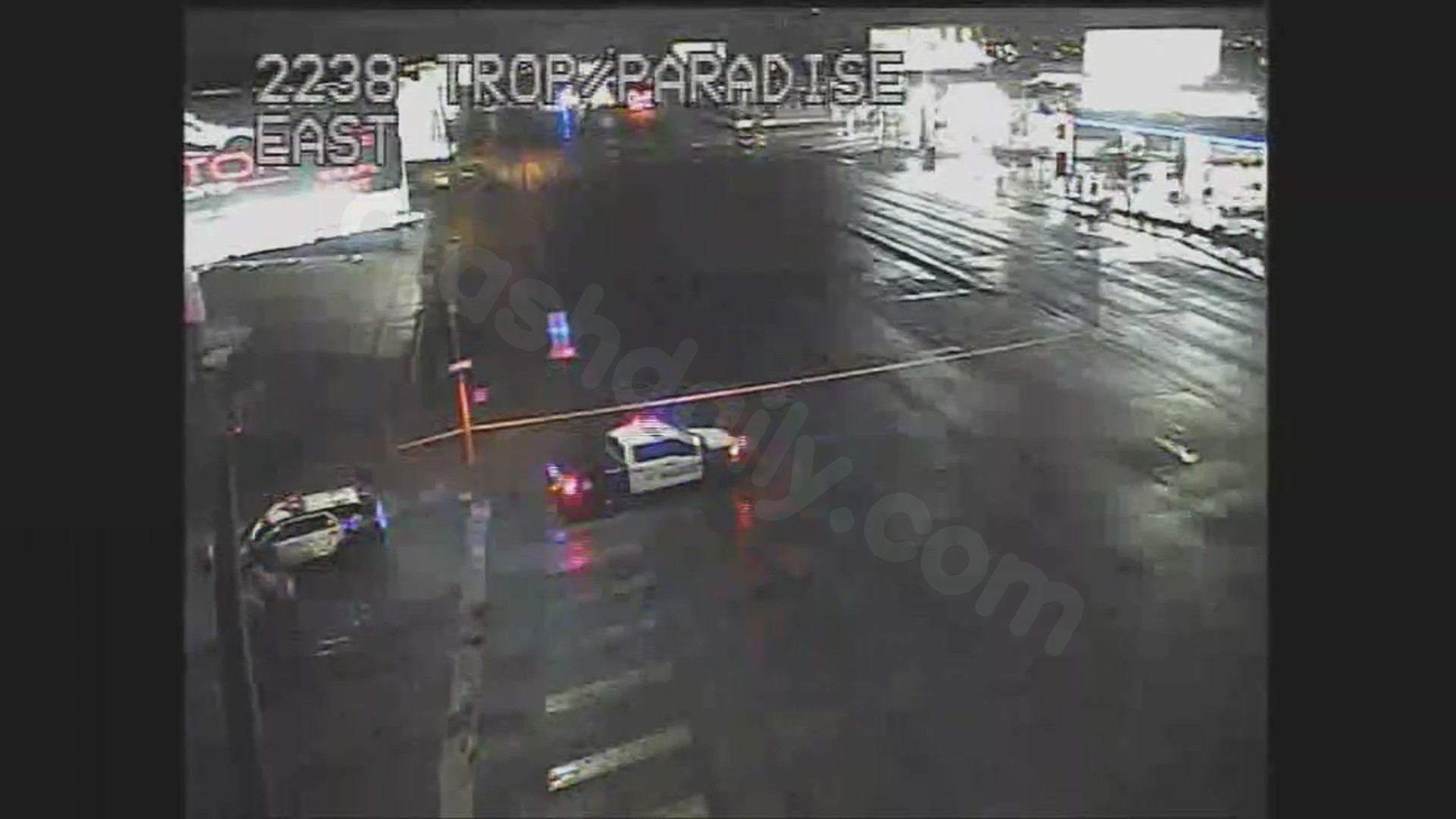 Driver hospitalized after car collides with light pole following hit-and-run in central Las Vegas valley