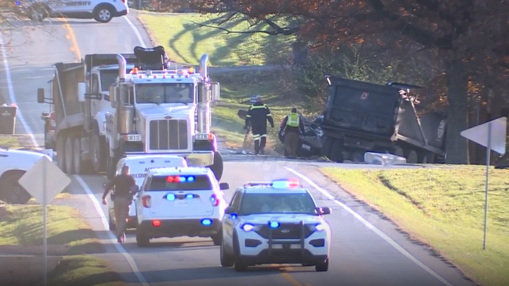 Fatal accident in northern Kentucky involving dump trucks and pickup.