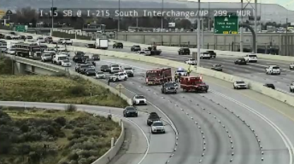 Traffic congestion near I-215 interchange due to collision on I-15