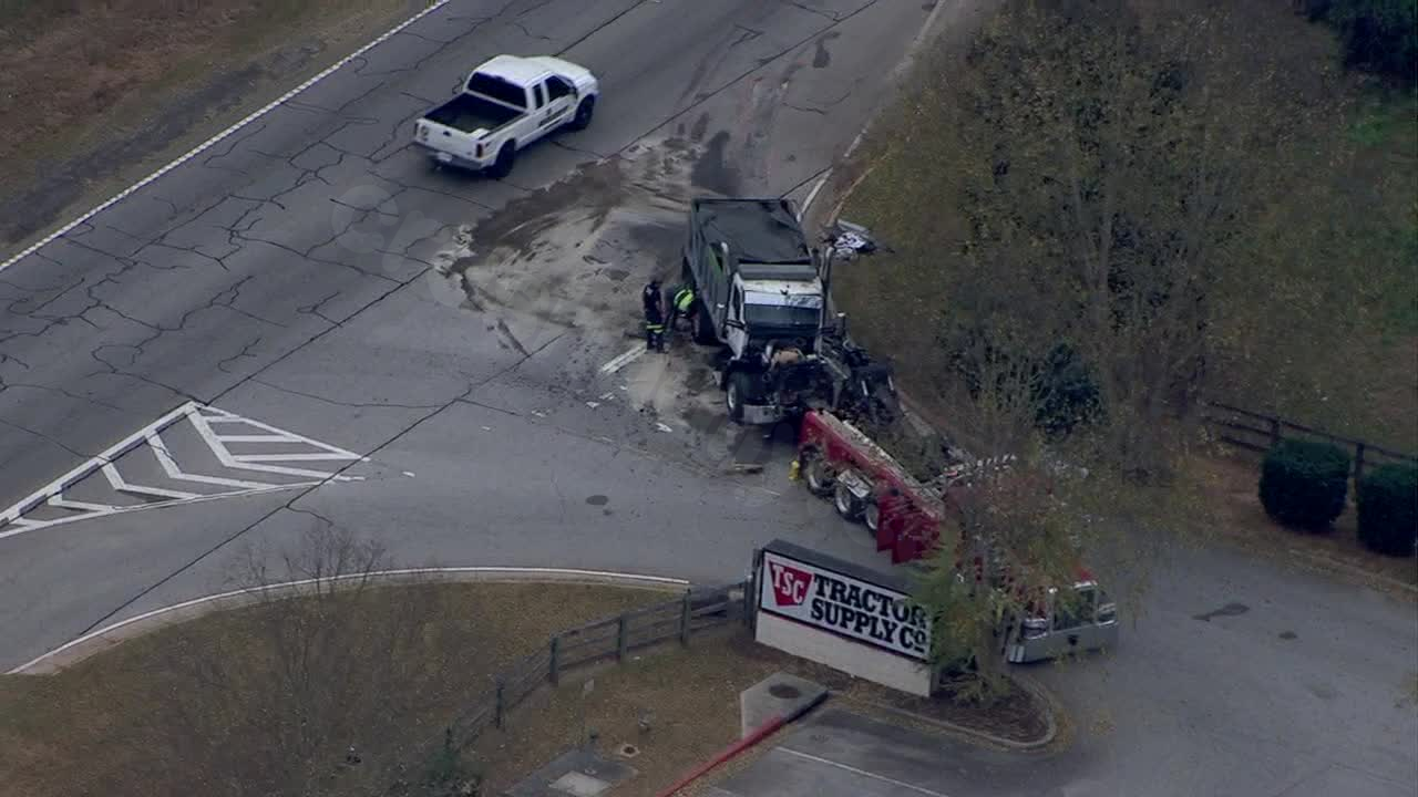 Tractor Supply entrance in McDonough closed due to crash and diesel spill.