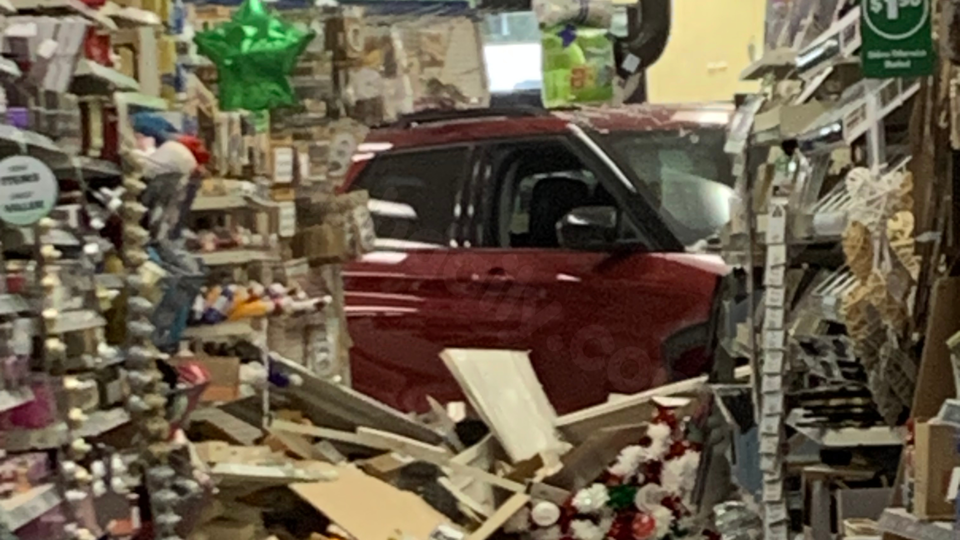 2 people hurt in Jenison Dollar Tree crash