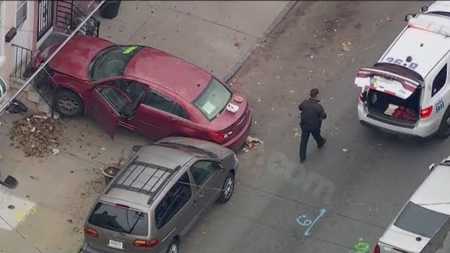 Philadelphia cop struck during traffic stop as car collides with residence, officer unharmed