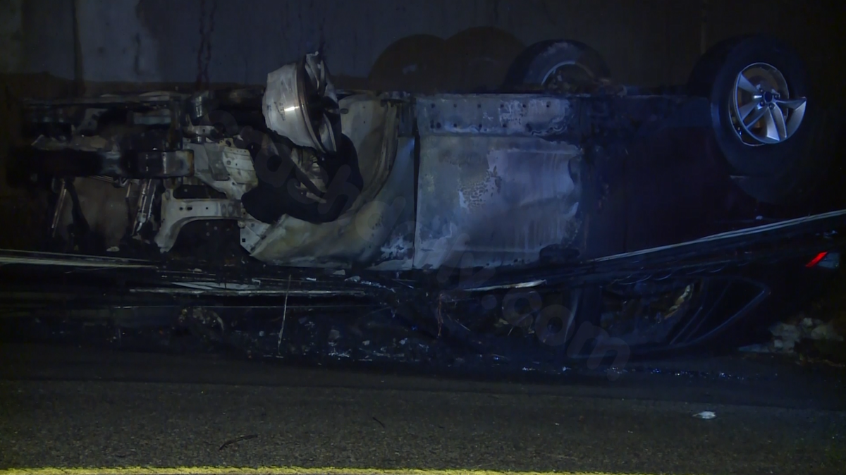 Car fire ignited by fallen wire after overnight crash in Riverside.