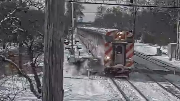 Metra train collides with car in Hinsdale, driver injured, according to police.
