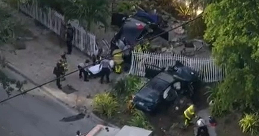 Four hurt in North Miami yard after two‑car collision