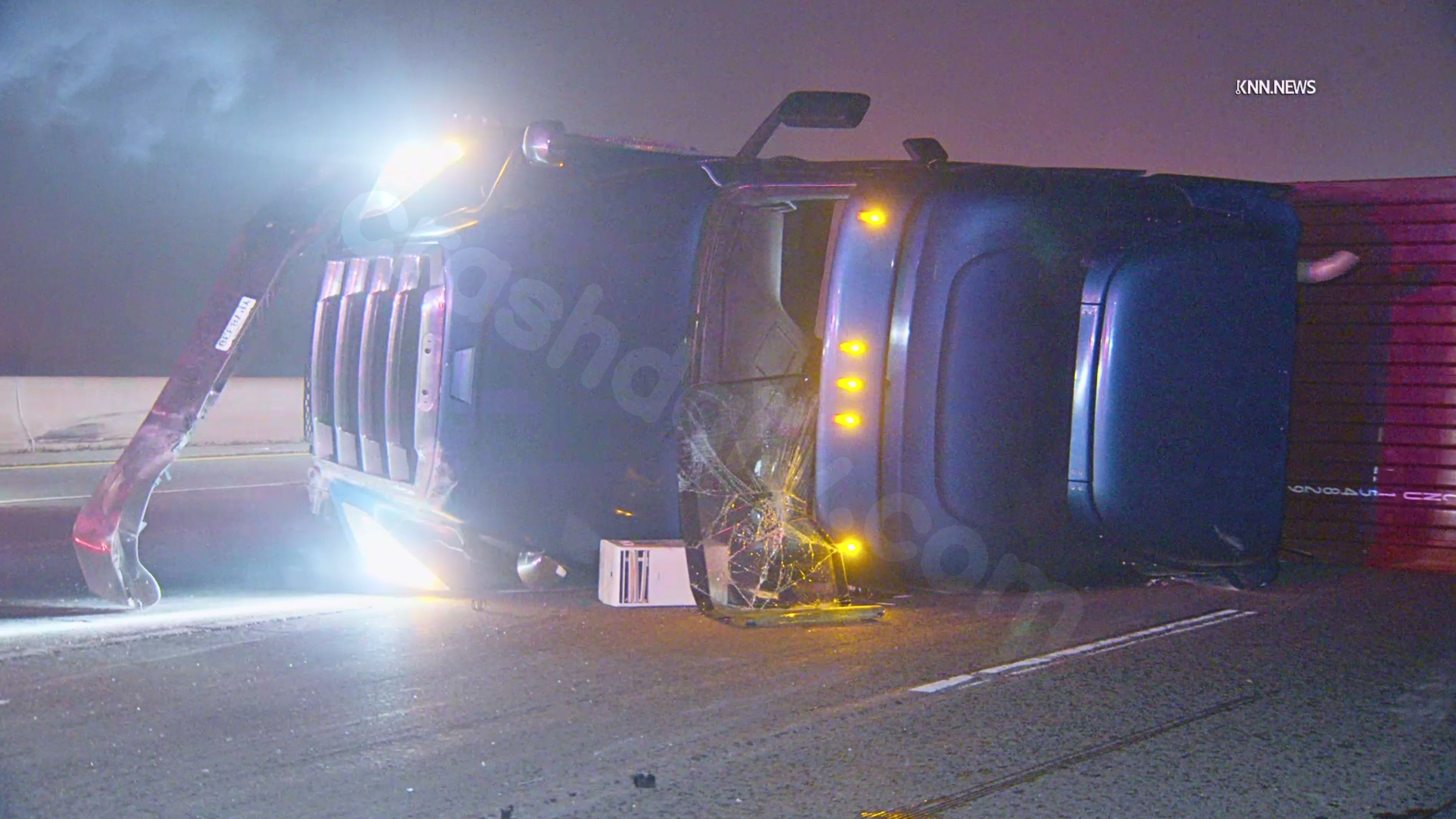 Big truck tips over on 91 Freeway in Anaheim, obstructing several lanes
