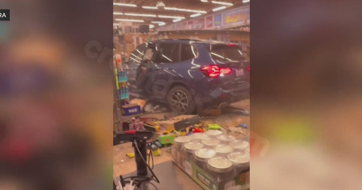 Car slams into Redwood City hardware shop, ignites