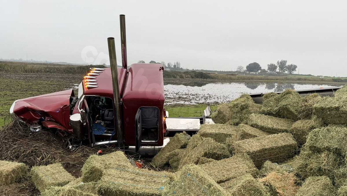 Driver dies in accident causing semi-truck to crash down slope on Highway 12 in Sacramento County