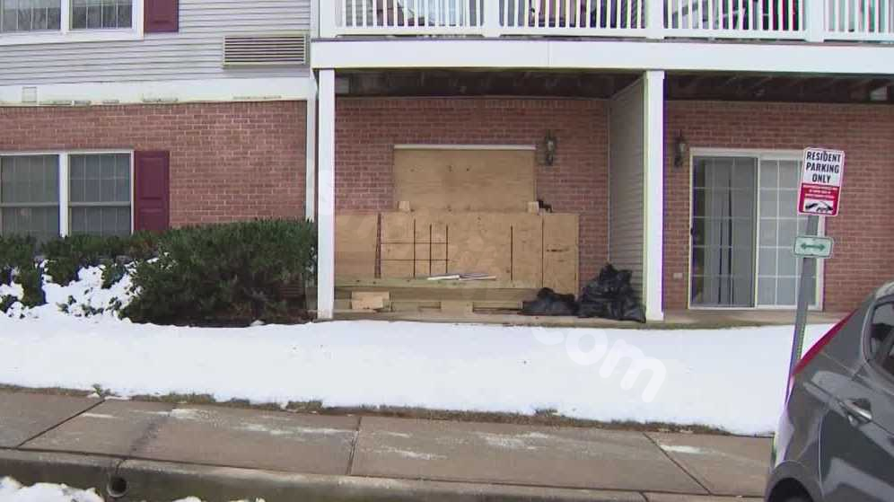 Woman unable to access apartment after car crashes into it.