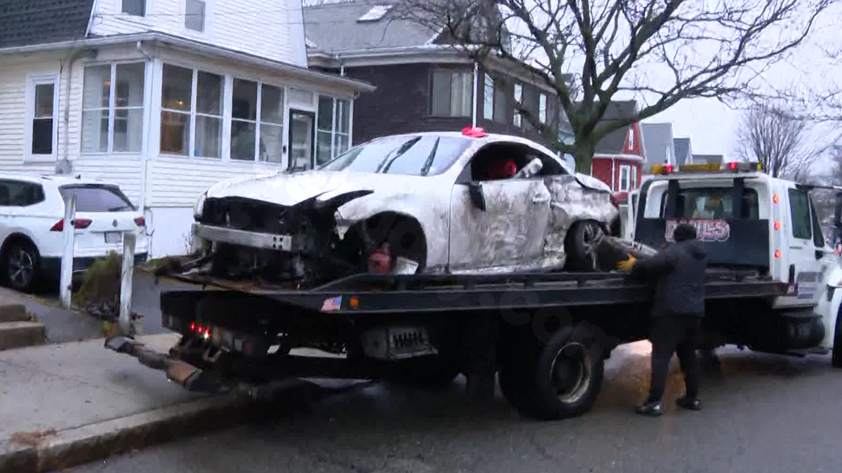 Car crashes into Everett house in rollover accident
