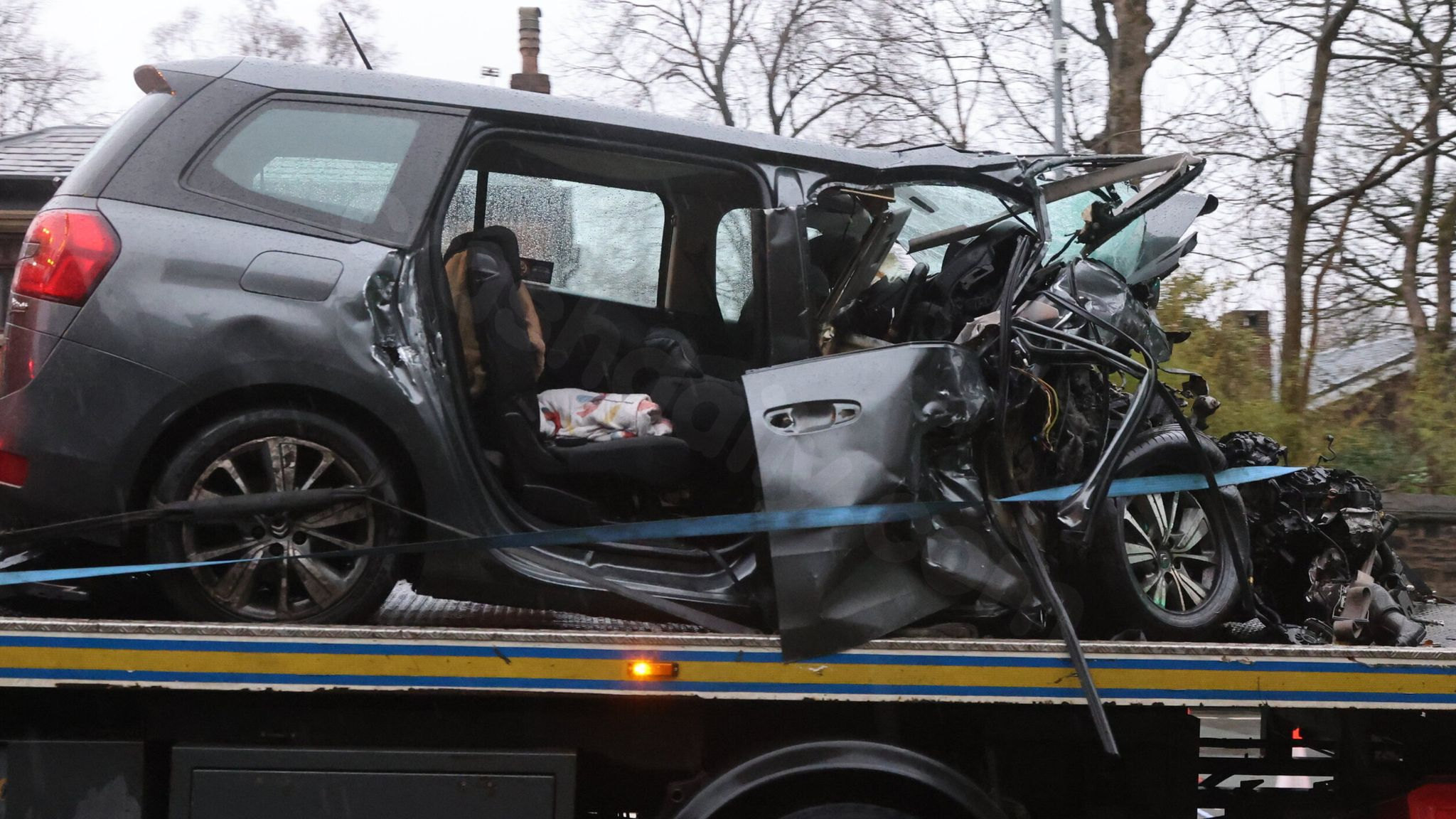 Fatal crash in Bolton involving car and taxi, three youths feared dead