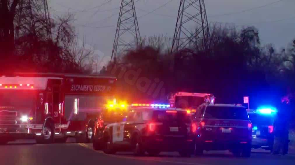 Road closure and police presence due to Sacramento crash.