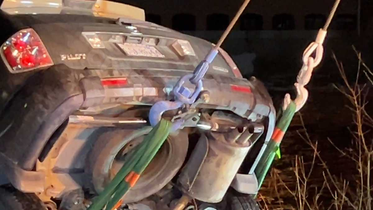 Car retrieved from Winooski River bank post parking lot mishap