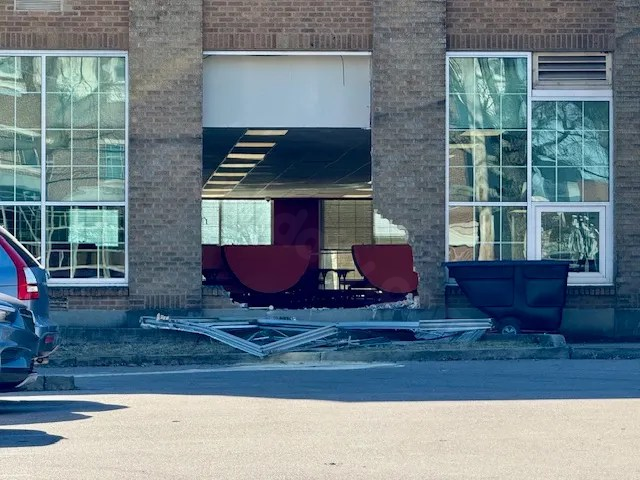 Students narrowly escape after car slams into cafeteria window
