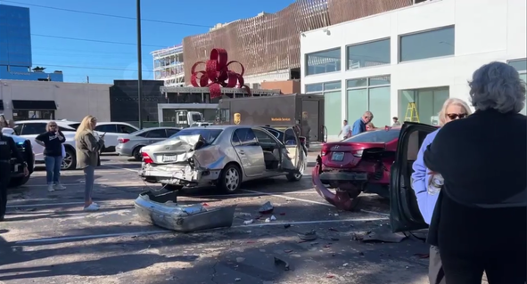 Police say two people in custody after chase suspect crashes into vehicles at River Oaks shopping center