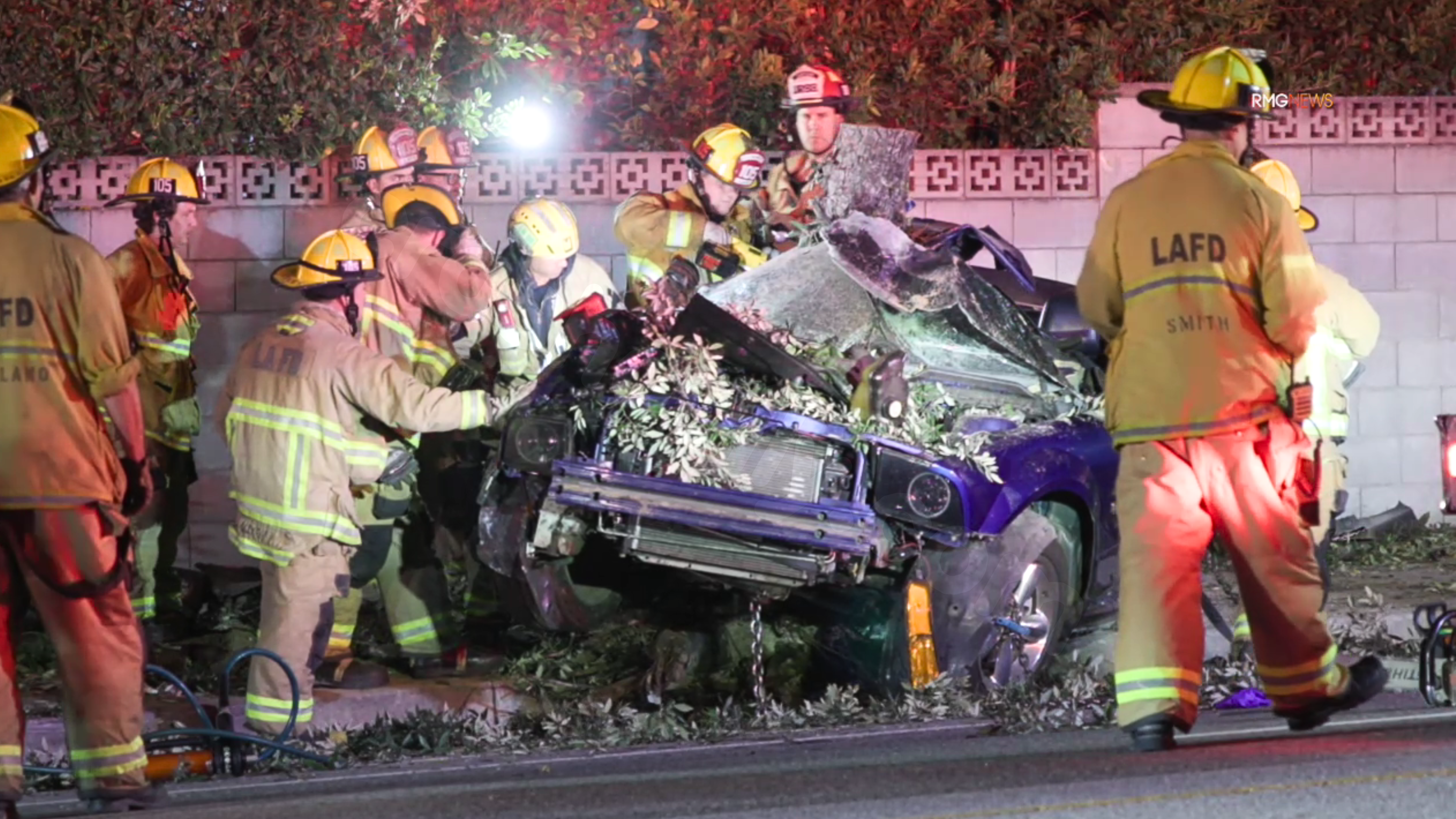 Fatal crash in San Fernando Valley: Mustang slides across lanes, strikes tree.