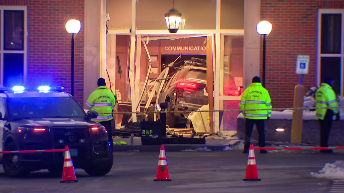 Vehicle crashes into police department lobby, causing it to be buried