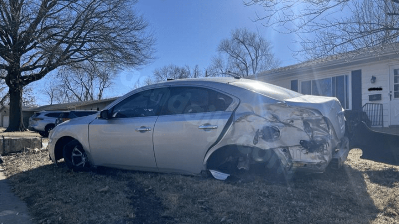 Police chase in Topeka ends with car crashing into front yard