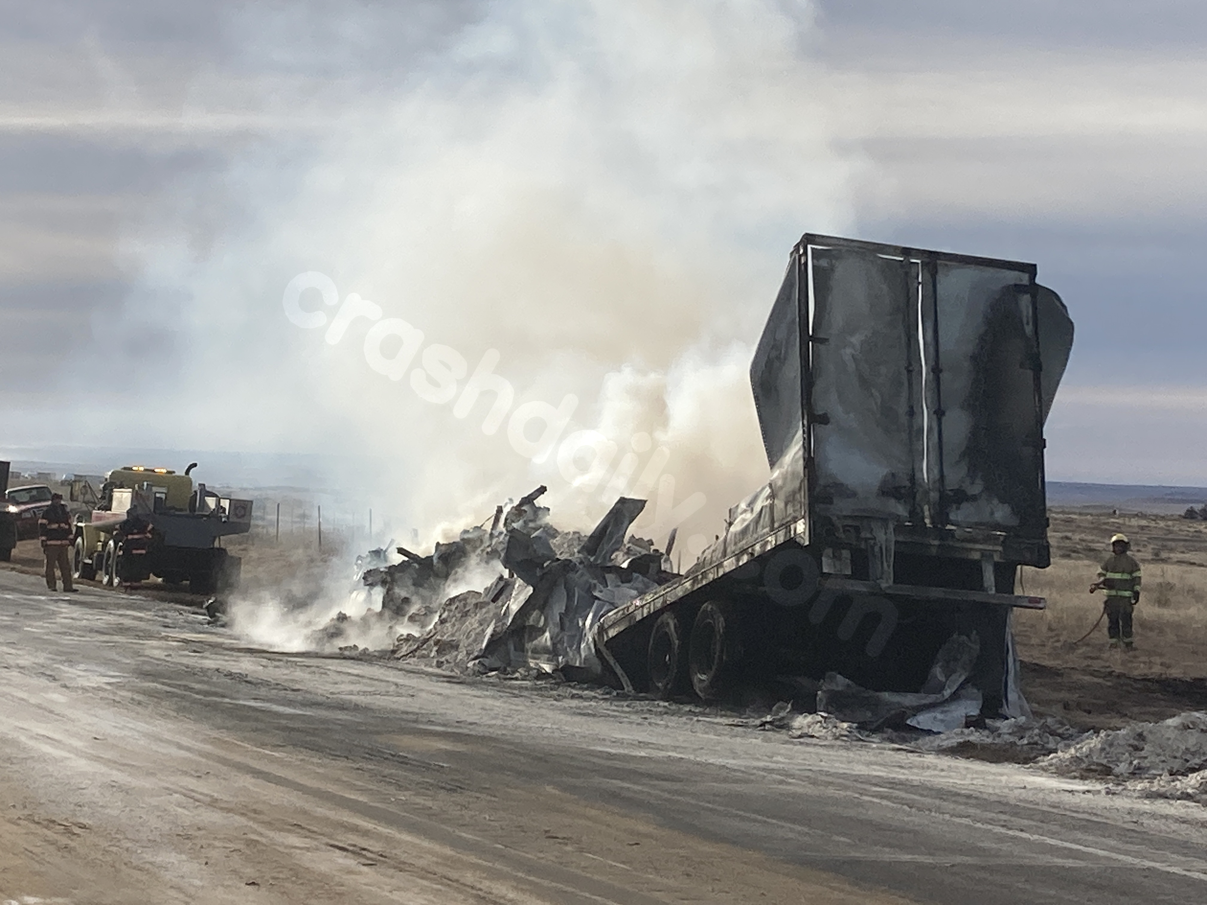 Multi-truck collision closes highway