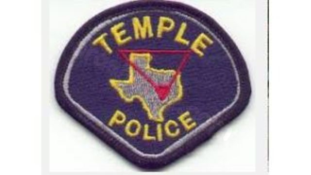 Police investigating car crash, 1 suspect detained.