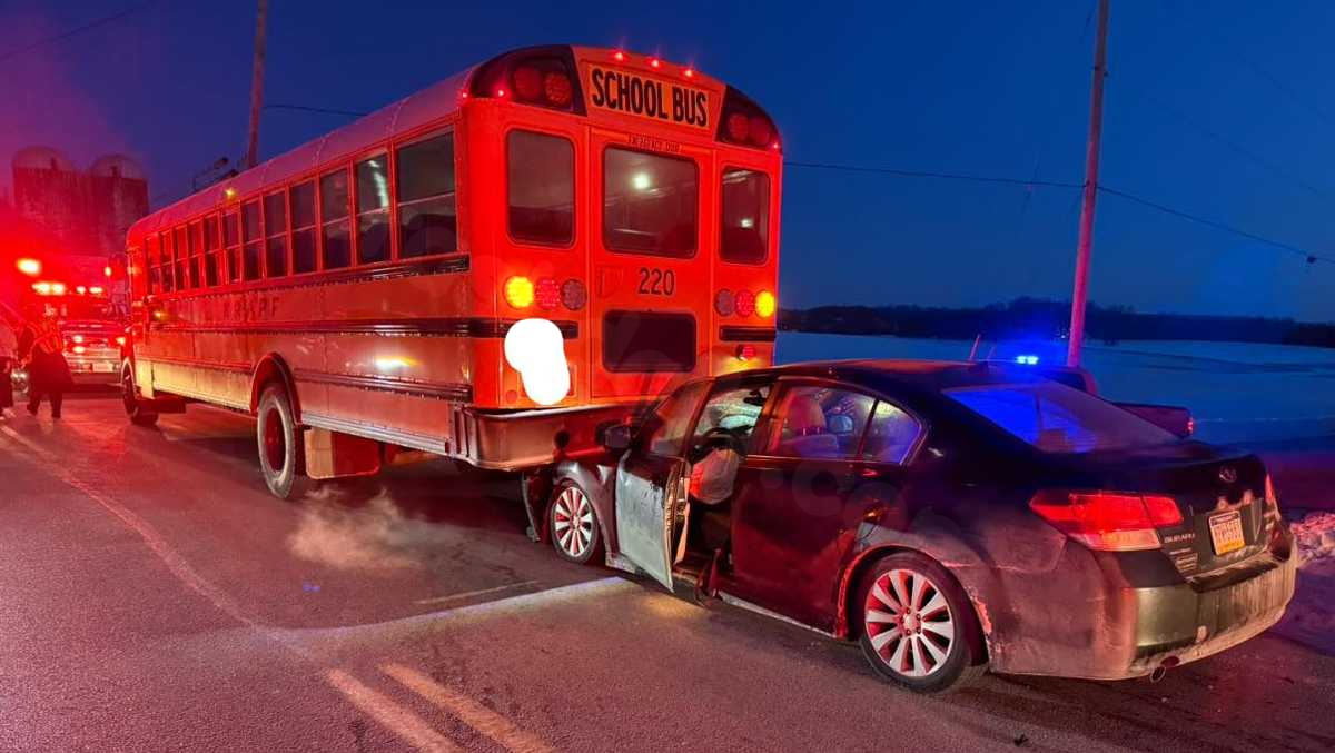 Bus driver taken to hospital after vehicle crashes underneath school bus, officials say
