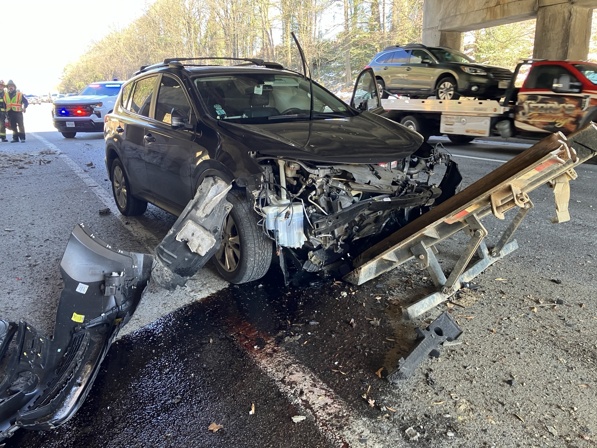 Tractor-trailer crash damages Henrico overpass, causing lengthy closure