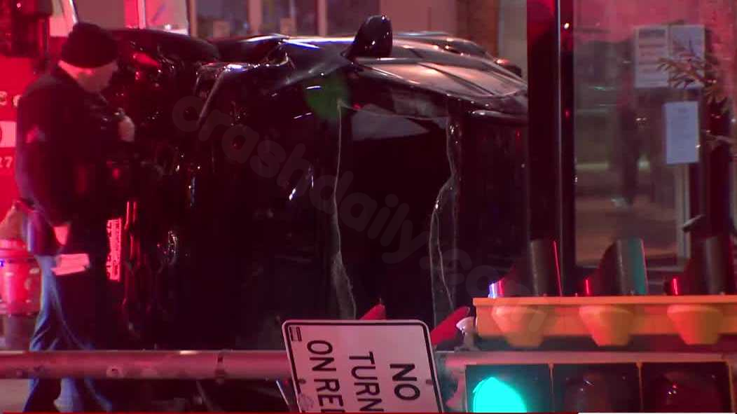 Car slams into pole, flips on its side on Milwaukee’s Upper East Side