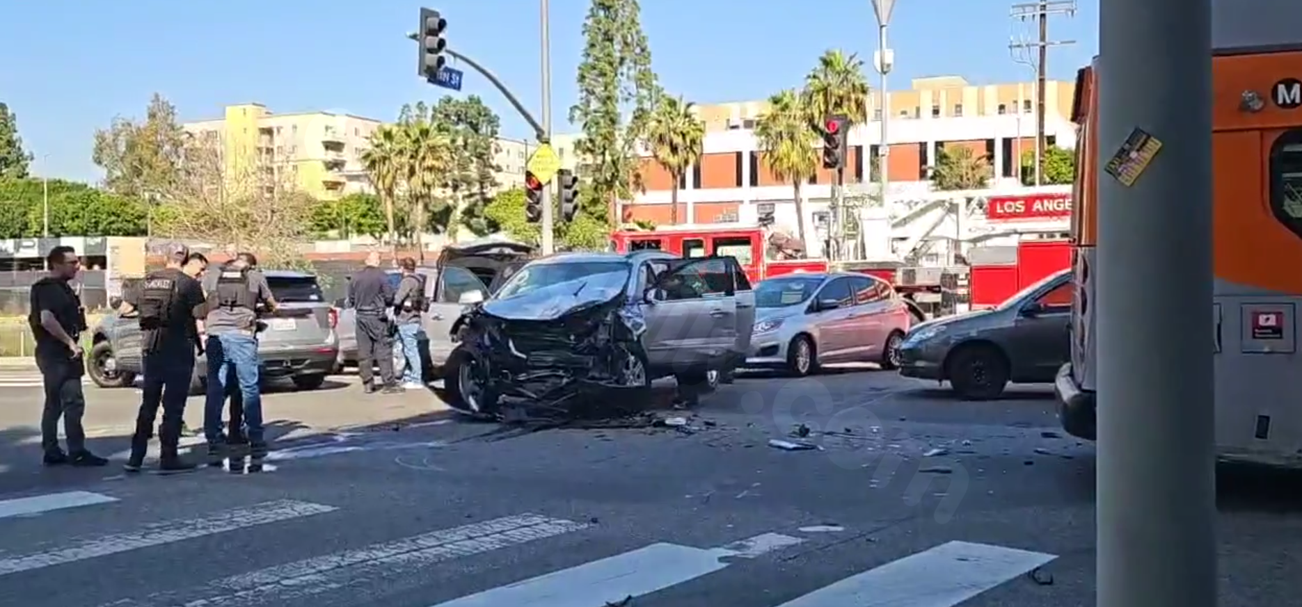 Pursuit suspects crash into Metro bus near downtown L.A.; 3 hospitalized