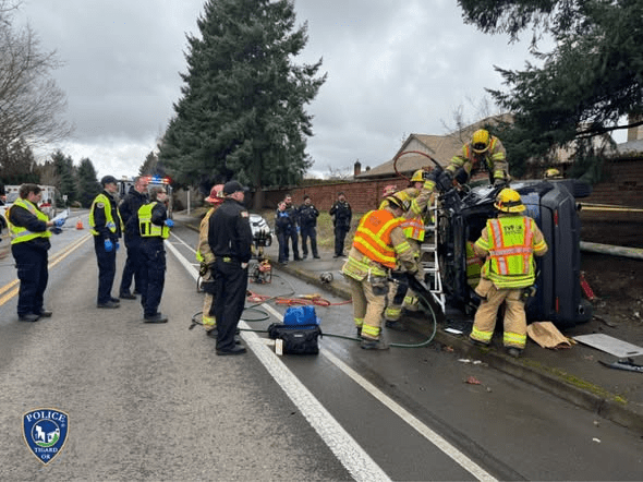 2-car crash leaves 2 people hurt after rescue from flipped SUV in Tigard