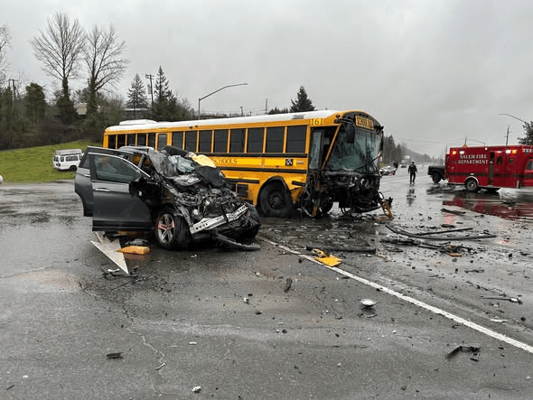 Salem crash involving school bus and SUV leaves 2 people injured