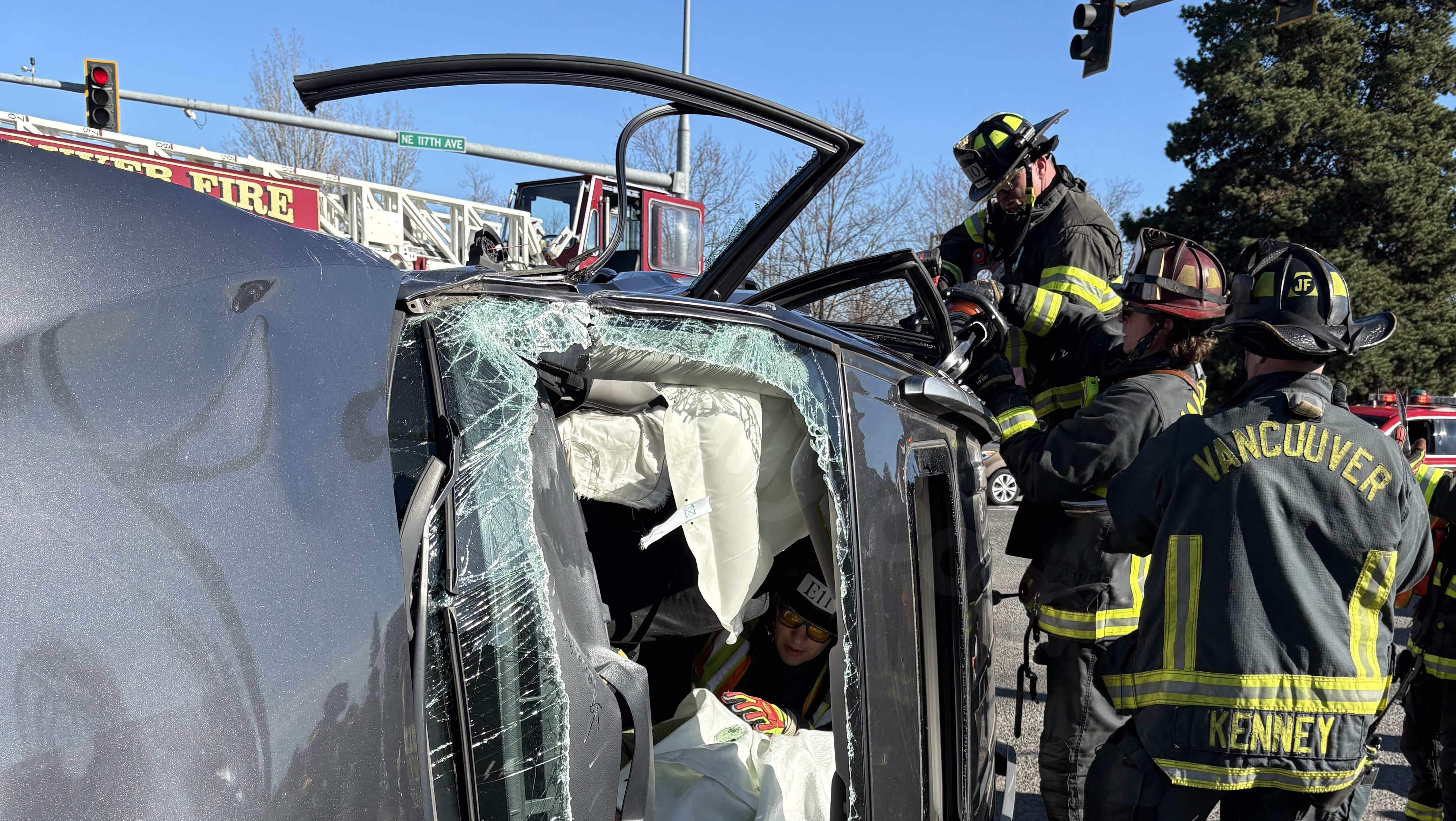 PHOTOS: 3 sent to hospital after firefighter rescue of overturned car in Vancouver crash