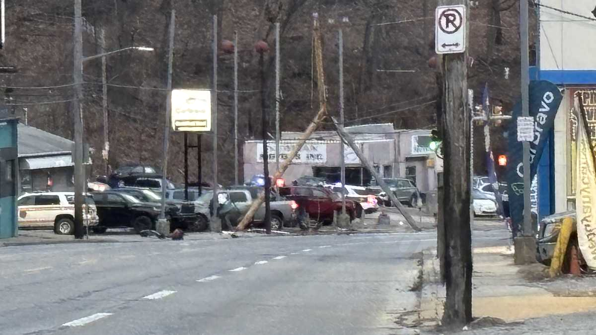 West Liberty Avenue closed after crash brings down pole in Pittsburgh