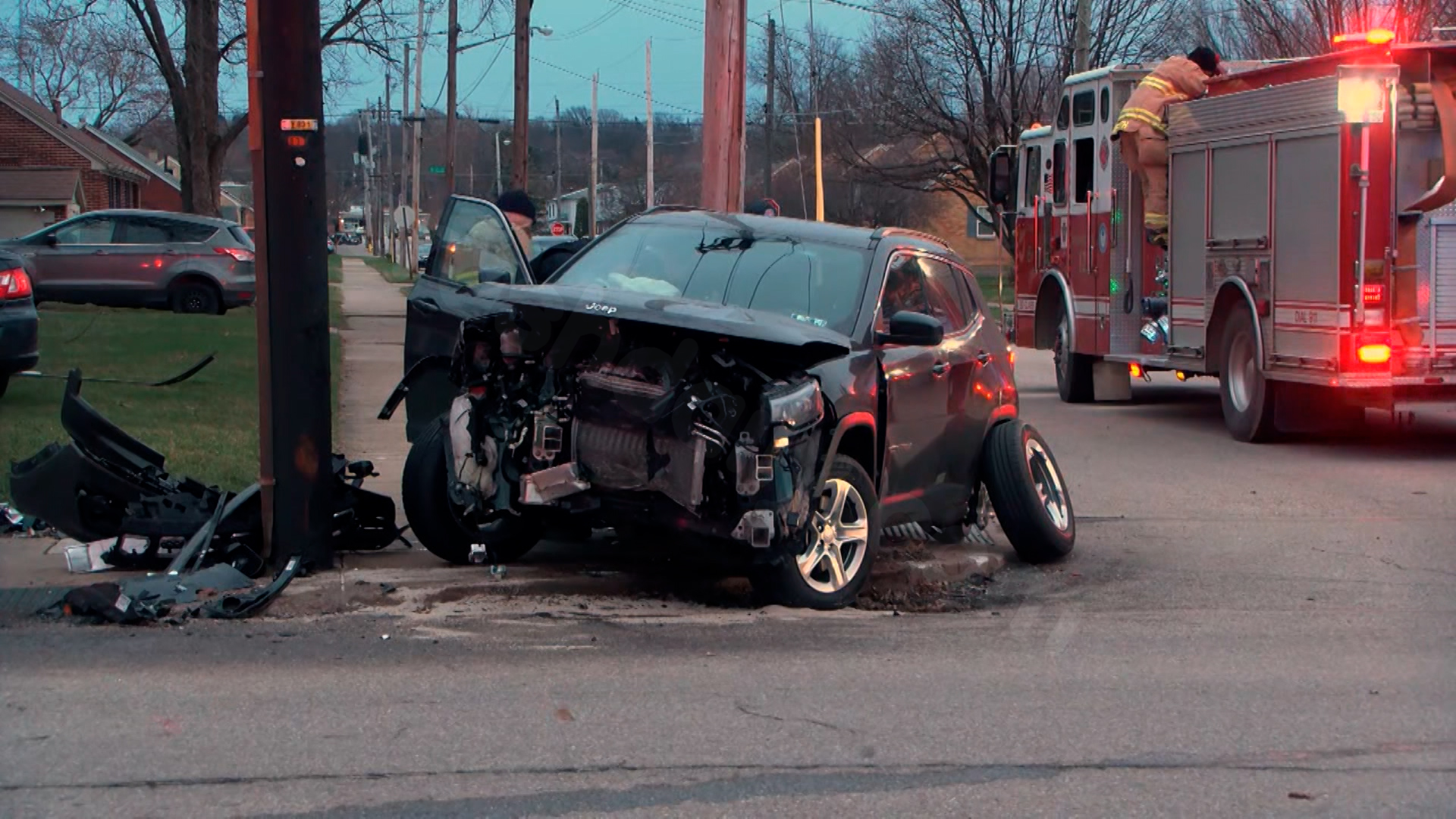 Two people hospitalized following crash that sent car into house