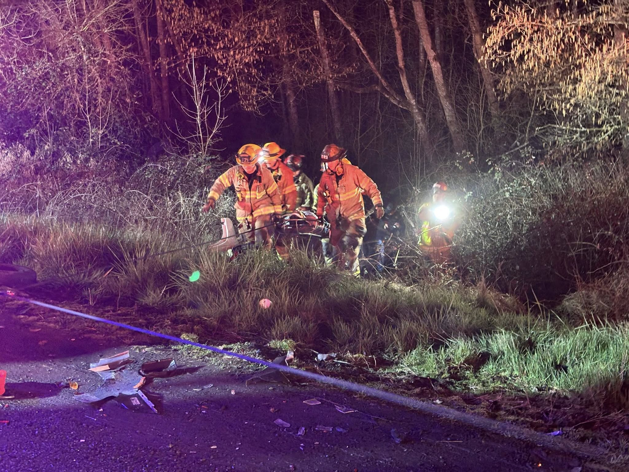 Vehicle goes down 200-foot embankment after 2-car crash