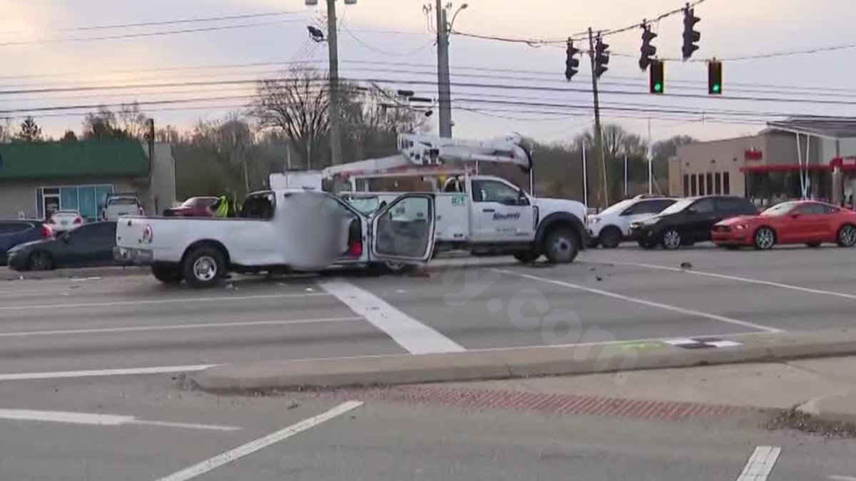 Police: Driver dies after crashing into utility bucket truck on Dixie Highway