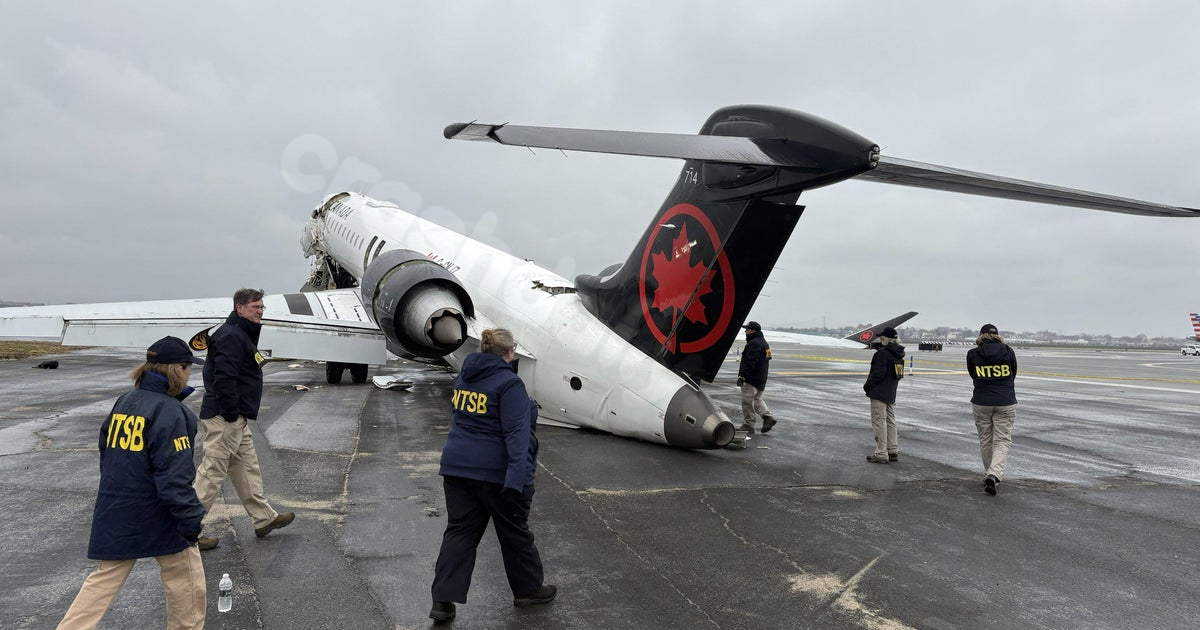 Pilots killed in LaGuardia Airport runway collision identified as 2 "young men at the start of their careers"