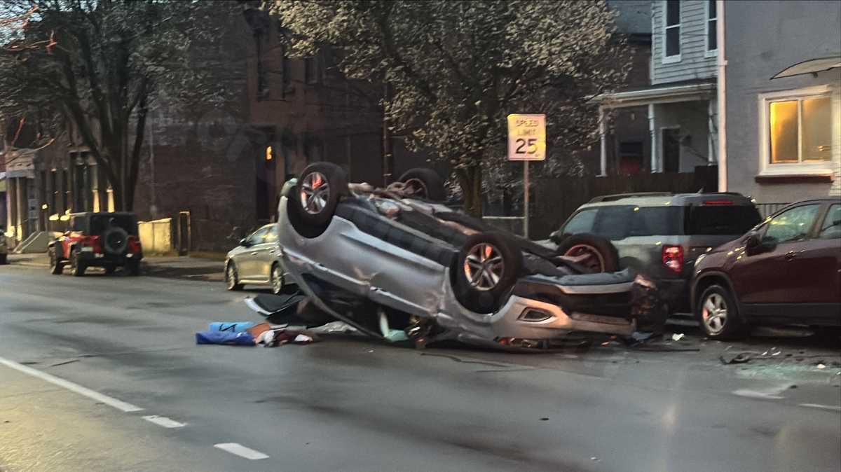 Person hospitalized after top of SUV heavily damaged in Pittsburgh rollover